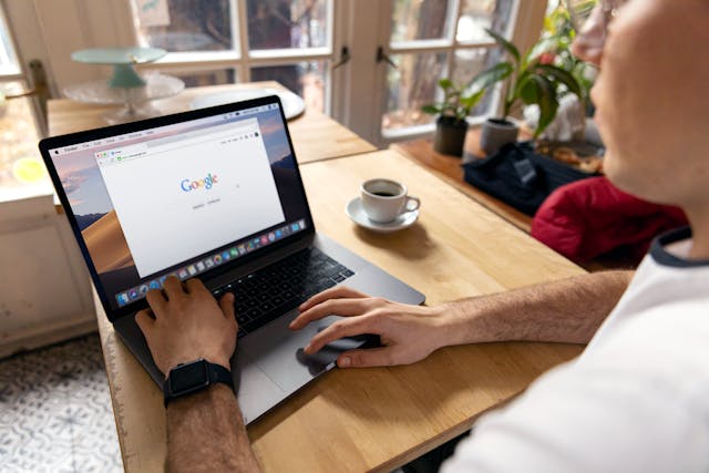 computer with google open working on reputation management for a construction brand